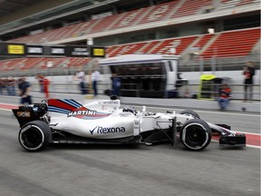 Williams driver Lance Stroll of Canada exits the team box during a Formula One pre-season testing session at the Catalunya racetrack in Montmelo, outside Barcelona, Spain, Tuesday, Feb. 28, 2017.