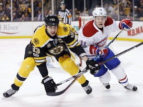 Boston Bruins' Zdeno Chara (33), of Slovakia, defends against Montreal Canadiens' Brendan Gallagher (11) during the first period of an NHL hockey game in Boston, Sunday, Feb. 12, 2017.