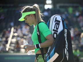 Eugenie Bouchard of Canada leaves the court after her loss against Ashleigh Barty of Australia at Crandon Park Tennis Center on March 22, 2017 in Key Biscayne, Florida.
