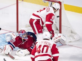 Red Wings' Justin Abdelkader scores past Canadiens goalie Al Montoya during first period Tuesday night at the Bell Centre.