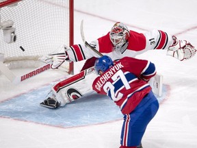 Montreal Canadiens centre Alex Galchenyuk (27) scores the first goal on Carolina Hurricanes goalie Eddie Lack (31) during first period NHL hockey action, in Montreal on Thursday, March 23, 2017.