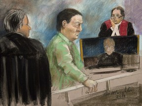 Benoît Roberge, a former high-ranking organized crime investigator, is seen in court in Montreal, in this artist's rendition, on Thursday, Oct. 10, 2013.