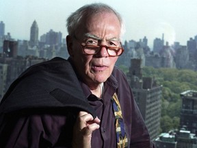 In this Nov. 2, 2004, file photo, author-columnist Jimmy Breslin poses for a photo in his New York apartment.