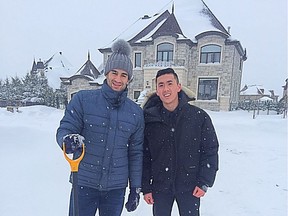 Canadiens captain Max Pacioretty poses for a picture with Lawrence Huang after helping him move his car, which was stuck in a snow bank.