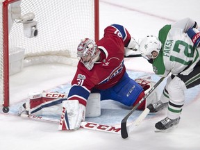 Canadiens goalie Carey Price stops Stars centre Radek Faksa during second period Tuesday night at the Bell Centre.