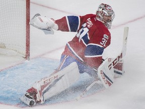 Montreal Canadiens goaltender Carey Price makes a save against the Ottawa Senators during second-period NHL hockey action in Montreal, Sunday, March 19, 2017.