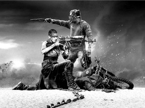 Charlize Theron and Tom Hardy in a scene from a special black and chrome version of George Miller's Mad Max: Fury Road.