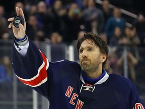 Henrik Lundqvist #30 of the New York Rangers celebrtaes a 4-2 victory over the Colorado Avalanche while recording his 400th NHL win at Madison Square Garden on Feb. 11, 2017 in New York City.