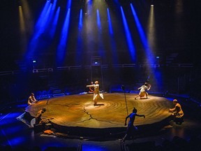 Dancers Akram Khan, Ching-Ying Chien and Christine Joy Ritter and four musicians are left exposed on the daring round set of Khan's Until the Lions.