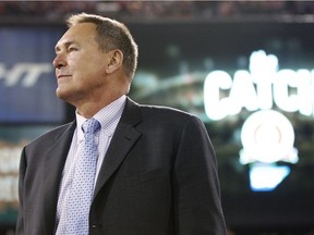In this Dec. 23, 2013, file photo, former San Francisco 49ers wide receiver Dwight Clark is honored at halftime of an NFL football game between the 49ers and the Atlanta Falcons in San Francisco. Clark stands near the spot where he made a catch so famous it is referred to as The Catch.  Clark says he has Lou Gehrig's disease and suspects playing football might have caused the illness. Clark announced Sunday, March 19, 2017. on Twitter that he has amyotrophic lateral sclerosis, a disease that attacks cells that control muscles. Clark linked to a post on his personal blog detailing his ALS diagnosis, but the site crashed Sunday night, apparently from an overflow of traffic.