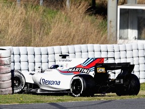 Lance Stroll of Canada, driving the (18) Williams Martini Racing FW40 Mercedes, crashes into a barrier on track during day three of Formula One winter testing at Circuit de Catalunya on March 1, 2017 in Montmelo, Spain.