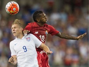 Aron Johannsson (9) of the United States and Alberto Quintero (19) of Panama head the ball during the CONCACAF Gold Cup match between Panama and United States at Sporting Park in Kansas City, Kansas July 13, 2015.