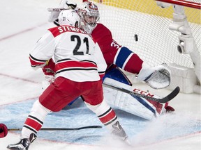 Hurricanes winger Lee Stempniak scores his second goal of the game against Canadiens goalie Carey Price during the third period Thursday night at the Bell Centre.