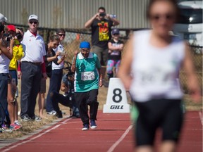 Man Kaur, 100, competes in the 100-metre run at the Americas Masters Games in Vancouver last August. Most experts consider exercise the best option for preserving vitality.