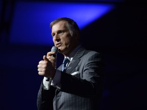 Maxime Bernier speaks at a Conservative Party leadership debate in Ottawa in February.