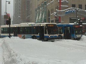 Buses are stuck in the snow at Metcalfe and Ste-Catherine Sts. after a huge snowstorm March 15, 2017.