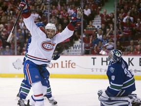 Montreal Canadiens centre Torrey Mitchell (17) celebrates his goal past Vancouver Canucks goalie Ryan Miller (30) during first period NHL action in Vancouver, B.C., Tuesday, Feb. 7, 2017.