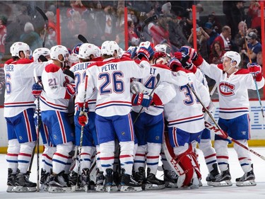 Members of the Montreal Canadiens celebrate their shoot-out victory against the Ottawa Senators at Canadian Tire Centre on March 18, 2017 in Ottawa.