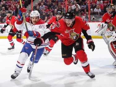 Mark Borowiecki #74 of the Ottawa Senators battles for position against Andrew Shaw #65 of the Montreal Canadiens in the third period at Canadian Tire Centre on March 18, 2017 in Ottawa.