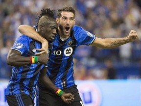 Impact forward Dominic Oduro, left, celebrates his goal with Argentinian teammate Ignacio Piatti against Toronto FC during MLS the Eastern Conference final last year. There are five players from Argentina on the Impact roster, including three starters.