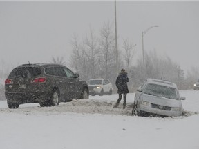 At a minimum, you should have a shovel, a snow brush/scraper and windshield wiper fluid in your car, the Canadian Automobile Association says.