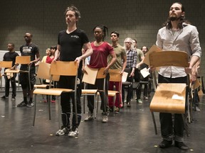 Cast members take part in an early rehearsal of Another Brick in the Wall. The opera includes variations on some familiar visual elements from the film and live versions of Pink Floyd's The Wall, "but the focus has to be on the words, on the singing, on the characters,” says the project's initiator, Pierre Dufour.