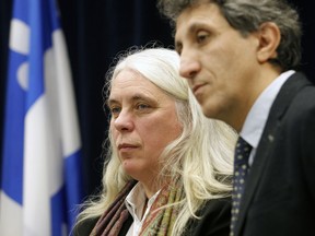 Manon Massé, left, the MNA for Sainte-Marie—Saint-Jacques and Amir Khadir, right, who represents the Plateau Mont Royal riding of Mercier, in January 2017.