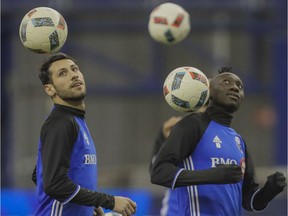 Impact forwards Matteo Mancosu, left, and Dominic Oduro practise during training camp at the Olympic Stadium in January. The team begins its regular season campaign on Saturday.