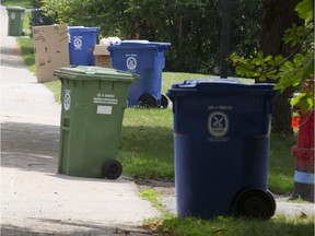 Bins for recyclable and compostable waste line St-Jean Blvd. in Pointe-Claire.