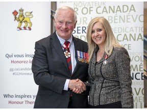St-Lazare's Glynis Burton-Jenkins receives the Sovereign Medal for Volunteers from Governor General David Johnston during a ceremony at the Montreal Children's Hospital on March 1. She is the founder and director of the Extended Hands food bank and community kitchen in Lachine.