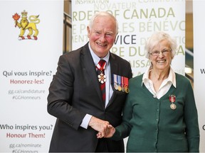 Sr. Virginia Lafleur recieves the Sovereign Medal for Volunteers from Governor General David Johnston during a ceremony at the Montreal Children's Hospital in Montreal, on March 1, 2017. Lafleur is a retired teacher from Queen of Angels Academy in Dorval.