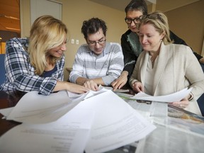 Gazette city editor Louise Solomita, deputy managing editor Jeff Blond, editor Lucinda Chodan and assistant city editor Brenda Branswell sort through submissions from readers in response to Josh Freed's column on errors and typos.