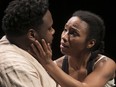 Jenny Brizard (as Marie-Josephe Angélique) and Tristan Lalla (as fellow slave) perform during the media call for Angélique, Lorena Gale’s play about the 18th-century slave tortured and executed after being accused of burning down a section of Old Montreal.