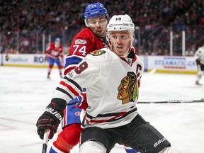 Canadiens' Alexei Emelin trails Blackhawks' Jonathan Toews during second period Tuesday night at the Bell Centre. Emelin's mistakes cost the Canadiens the game, Jack Todd writes.