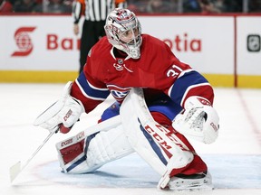 Montreal Canadiens' Carey Price tracks the puck into the corner during second period of National Hockey League game against the Chicago Blackhawks in Montreal Tuesday March 14, 2017.