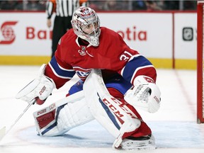 Montreal Canadiens Carey Price tracks the puck into the corner during second period of National Hockey League game against the Chicago Blackhawks in Montreal Tuesday March 14, 2017.