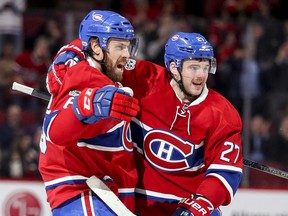 Montreal Canadiens Shea Weber, left, celebrates his goal against the Chicago Blackhawks with teammate Alex Galchenyuk during third period of National Hockey League game in Montreal Tuesday March 14, 2017.