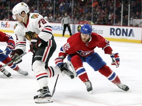 Montreal Canadiens' Steve Ott pursues Chicago Blackhawks' Artemi Panarin during third period in Montreal Tuesday March 14, 2017.