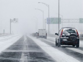 Snowy commute into Montreal on Highway 20 Tuesday March 14, 2017 as a snowstorm moves in and is expected to bring upwards of 25cm to the area.