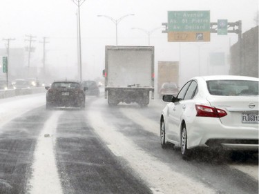 Snowy commute into Montreal on Highway 20 Tuesday March 14, 2017 as a snowstorm moved in, expected to bring upwards of 25 cm of snow to the area.