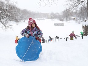 Anna Joffroy makes her way up the hill at Lafontaine Park on Wednesday March 15, 2017. Montreal was hit by a massive snowfall overnight.