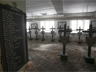 MONTREAL, QUE.: MARCH 15, 2017 -- Headstones of Sulpician monks in the crypt at the Grand Seminaire de Montreal on Wednesday March 15, 2017 during the open house for the media. (Pierre Obendrauf / MONTREAL GAZETTE) ORG XMIT: 58269 - 3681