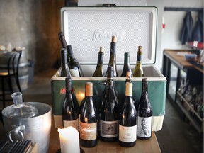 Wine bottles are kept chilled in a camping cooler at Loïc, an über cool wine bar on the western strip of Notre-Dame St. in St-Henri.