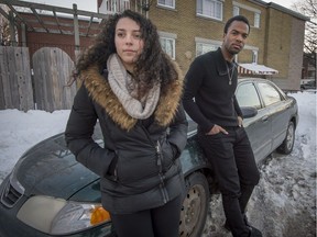 Helena Backa, left, and Andrew Denis-Lynch by their car in Montreal, on Saturday, March 18, 2017. Denis-Lynch is an acting student who says he was a victim of racial profiling by police and his girlfriend stepped in to help defuse the situation.
