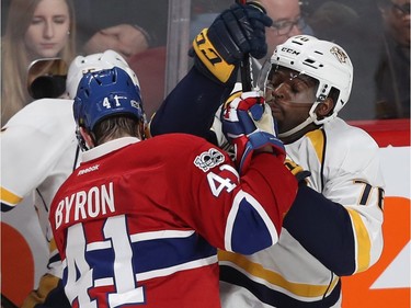 Montreal Canadiens' Paul Byron (41) and Nashville Predators' P.K. Subban (76) mix it up during second period NHL action in Montreal on Thursday March 2, 2017.
