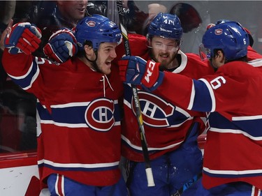 Montreal Canadiens' Paul Byron (41) celebrates his game-winning unassisted goal with teammates Andrew Shaw (65) and Shea Weber (6) during third period NHL action in Montreal on Thursday March 2, 2017. Canadiens won the game 2-1 against the Nashville Predators.