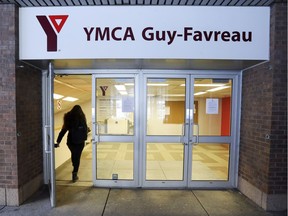 A member enters the YMCA in Place Guy-Favreau in Montreal Wednesday March 22, 2017. The Y has been given a 1-year reprieve on a rent increase that threatened to cause it to close.