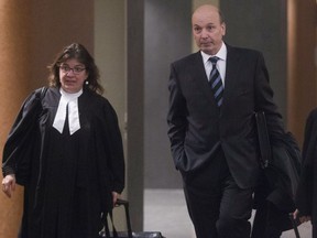 Former city of Montreal executive committee chairman Frank Zampino, with his lawyer Isabel Schurman, leaving the courtroom in Montreal on March 7, 2016.