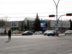 A pedestrian makes a diagonal crossing at the corner of St.-Jean Boulevard and Douglas-Shand Ave. in Pointe-Claire last Friday.