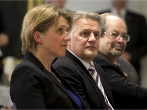 Anja Geitmann, dean of the faculty of agricultural and environmental sciences at McGill University, sits with Agriculture Minister Laurent Lessard (centre) and Jacques-Cartier MNA Geoffrey Kelley (right) as they wait to announce a $5 million grant for Macdonald campus in Ste-Anne-de-Bellevue on March 31.